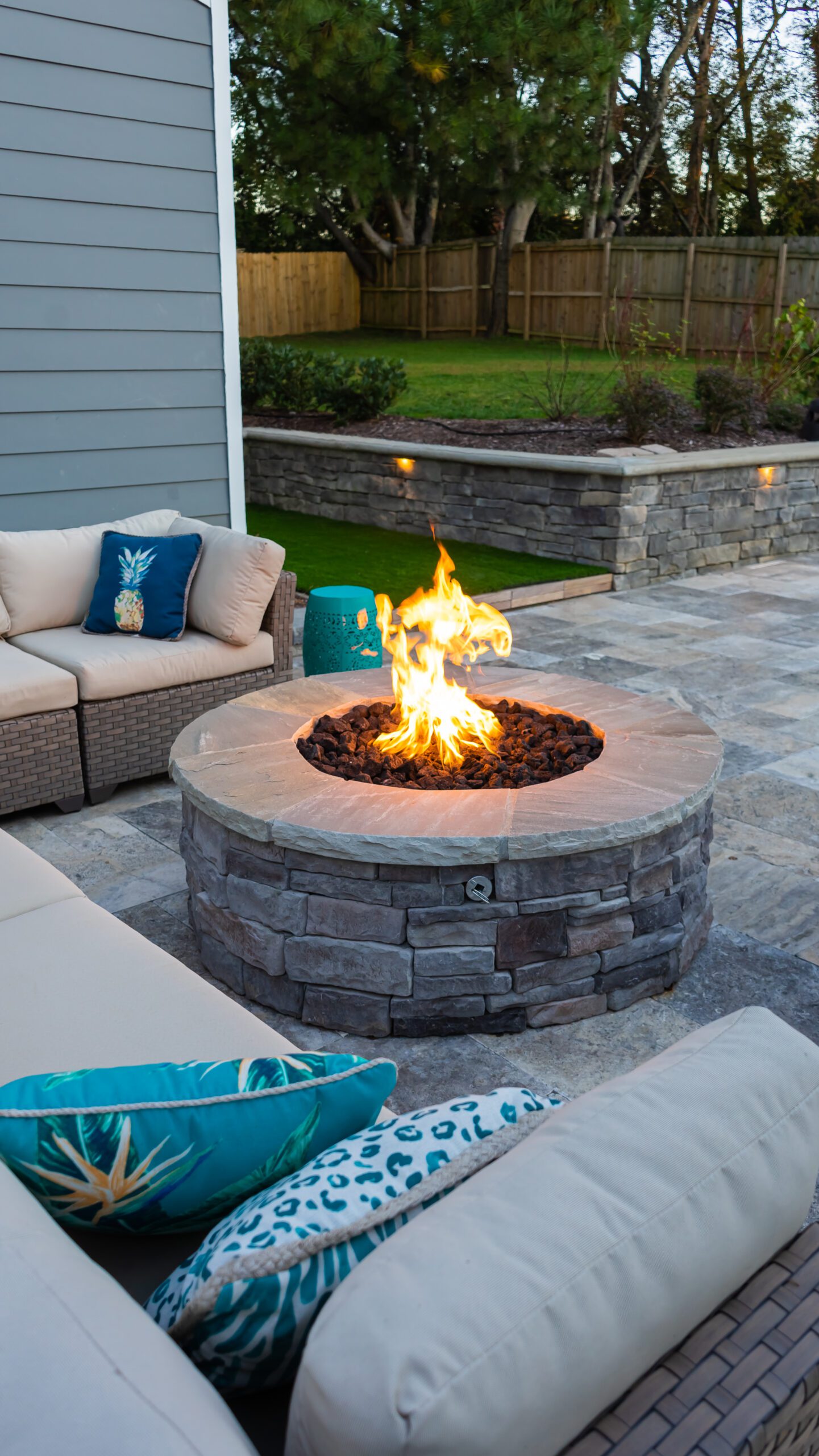 Custom Stone Gas Firepit - Luxury Landscape, Pool Builders, and Outdoor Living Designs in Nashville, TN