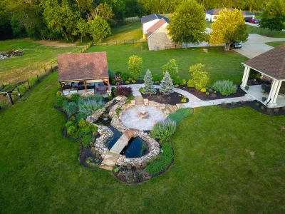 A serene backyard scene with a fire pit and a charming gazebo, ideal for relaxing evenings outdoors.