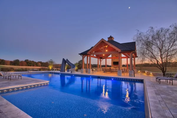 A large residence with a pool and an inviting patio for leisure activities.